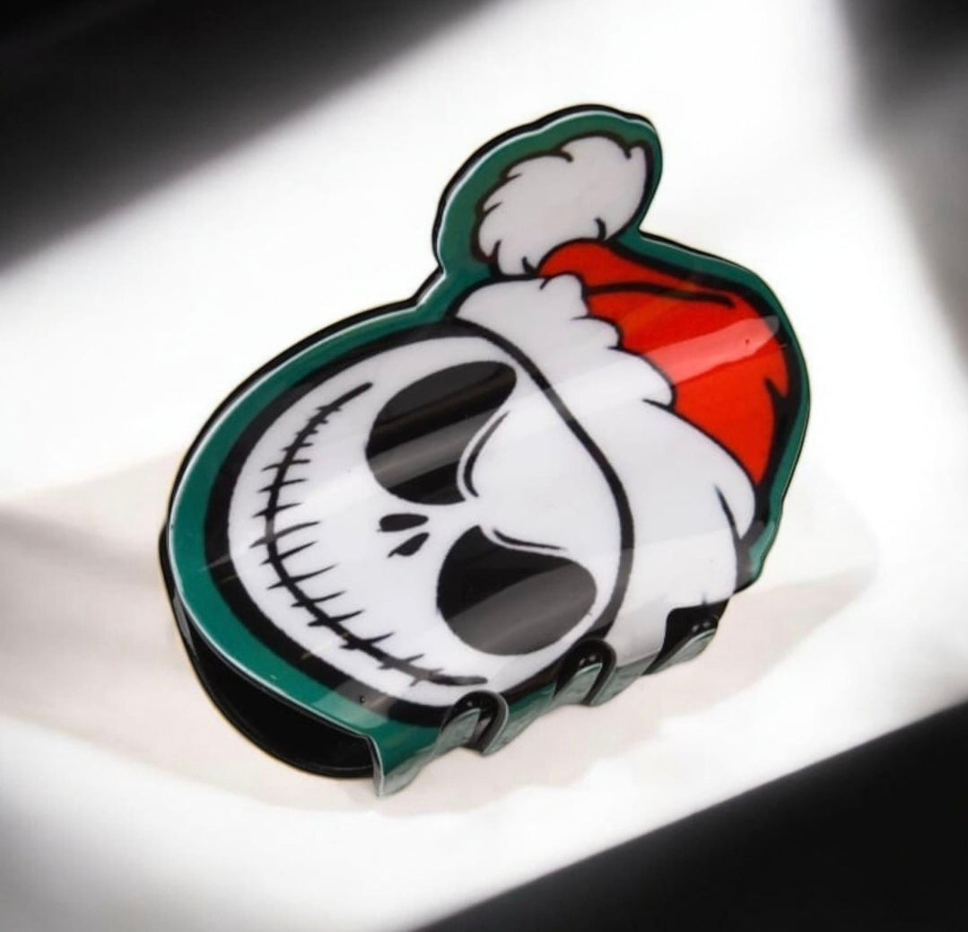Jack skellington inspired hair clip wearing a santa hat