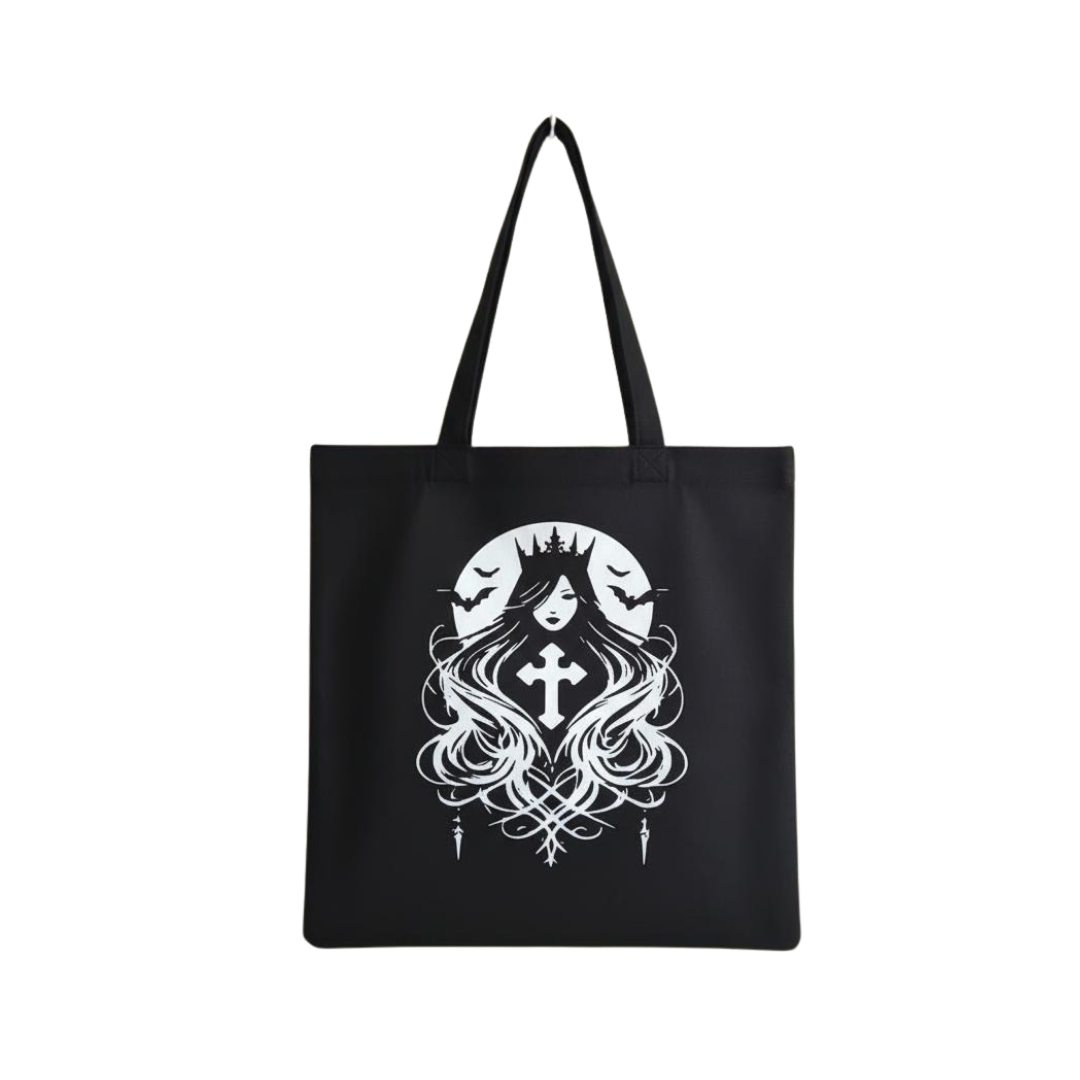 Black tote bag with a white graphic design of a woman with a crown and cross on a white background