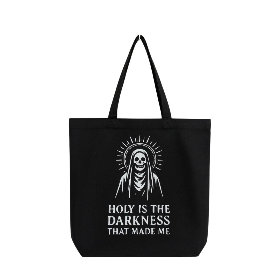 Black tote bag with a skull and crossbones design and text on a white background