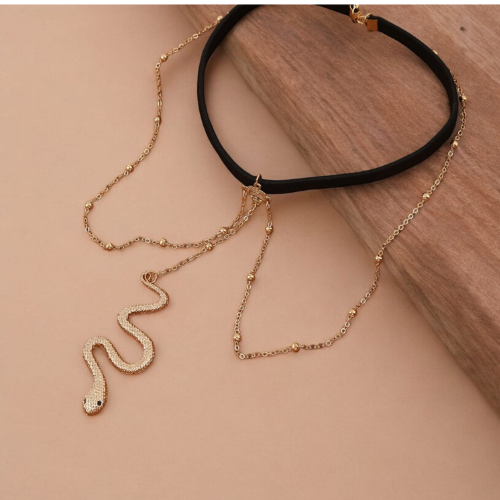 gothic gold coloured snake pendant thigh chain for the alternative and gothic fashion UK