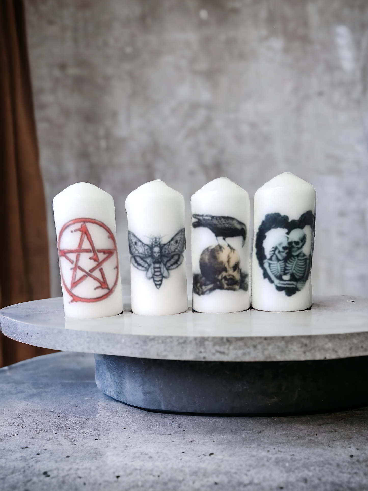Gothic horror home décor with skull candles and eerie wall art.