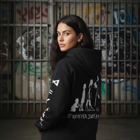 Person wearing a black hoodie with white graphics and text, from baby to witch transition black gothic hoodie 