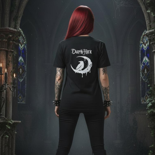 Person wearing a black t-shirt with raven and moon design with 'Dark Hex' logo in a gothic setting
