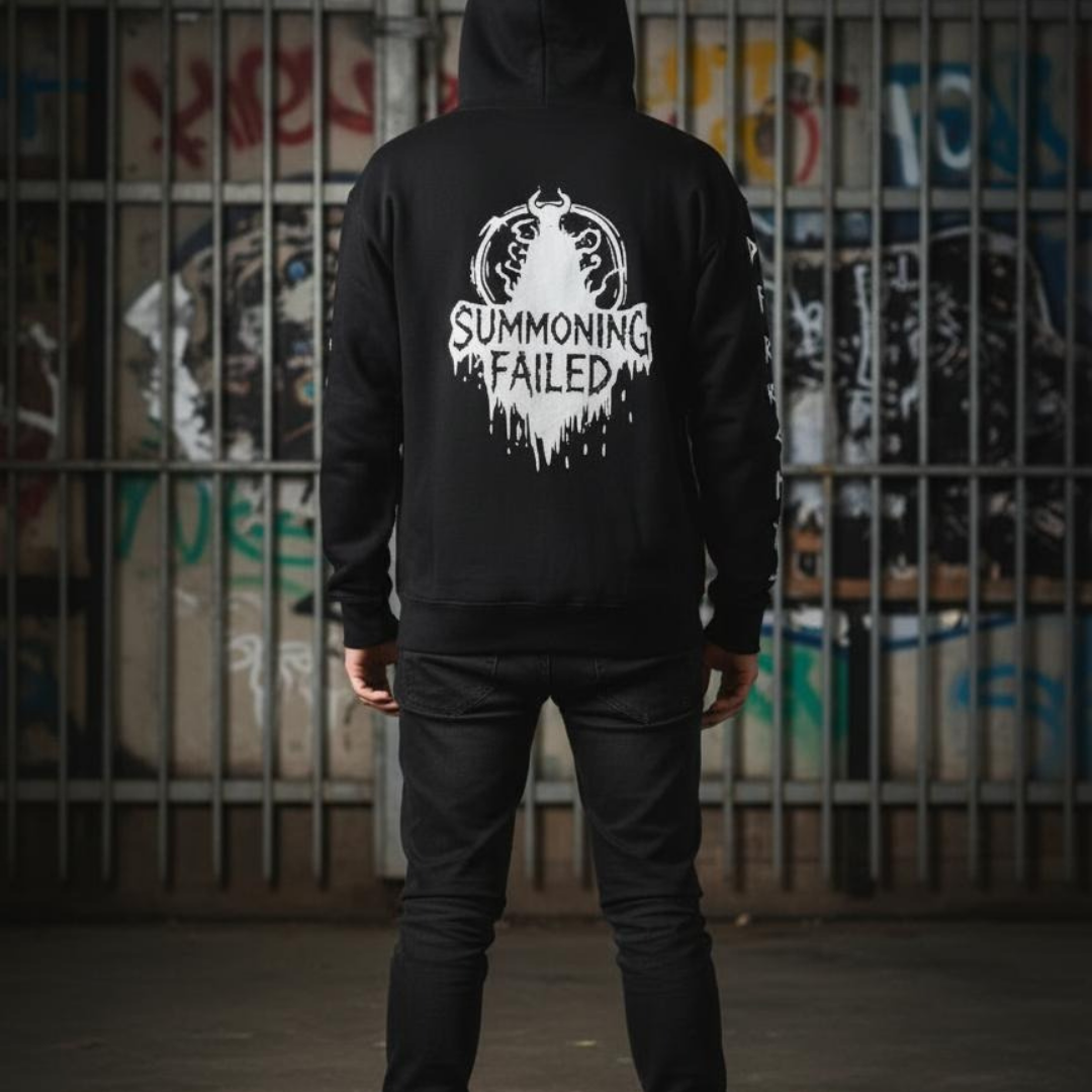 a black hoodie with summoning failed black hoodie graphic and text . horror gothic and alternative streetwear