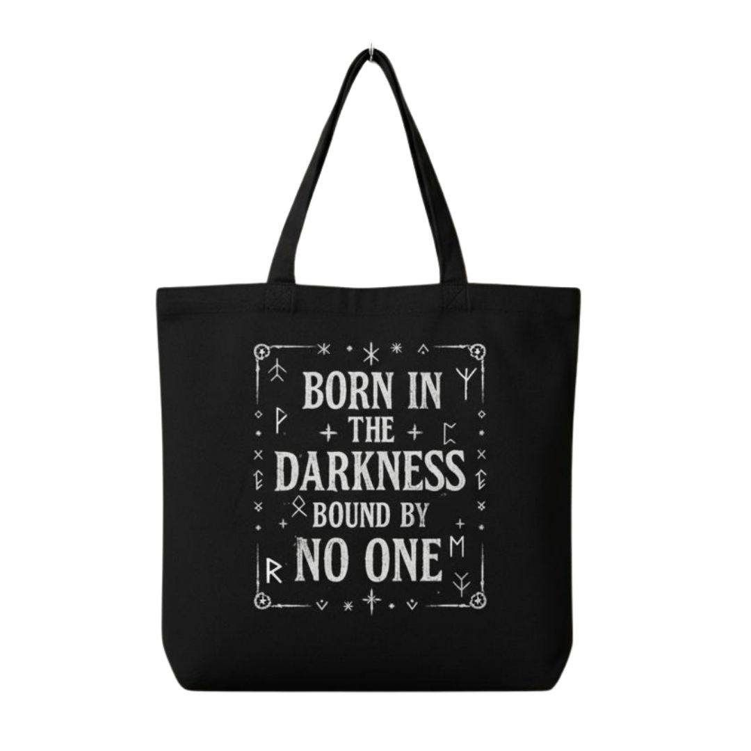 Black tote bag with white text on a white background